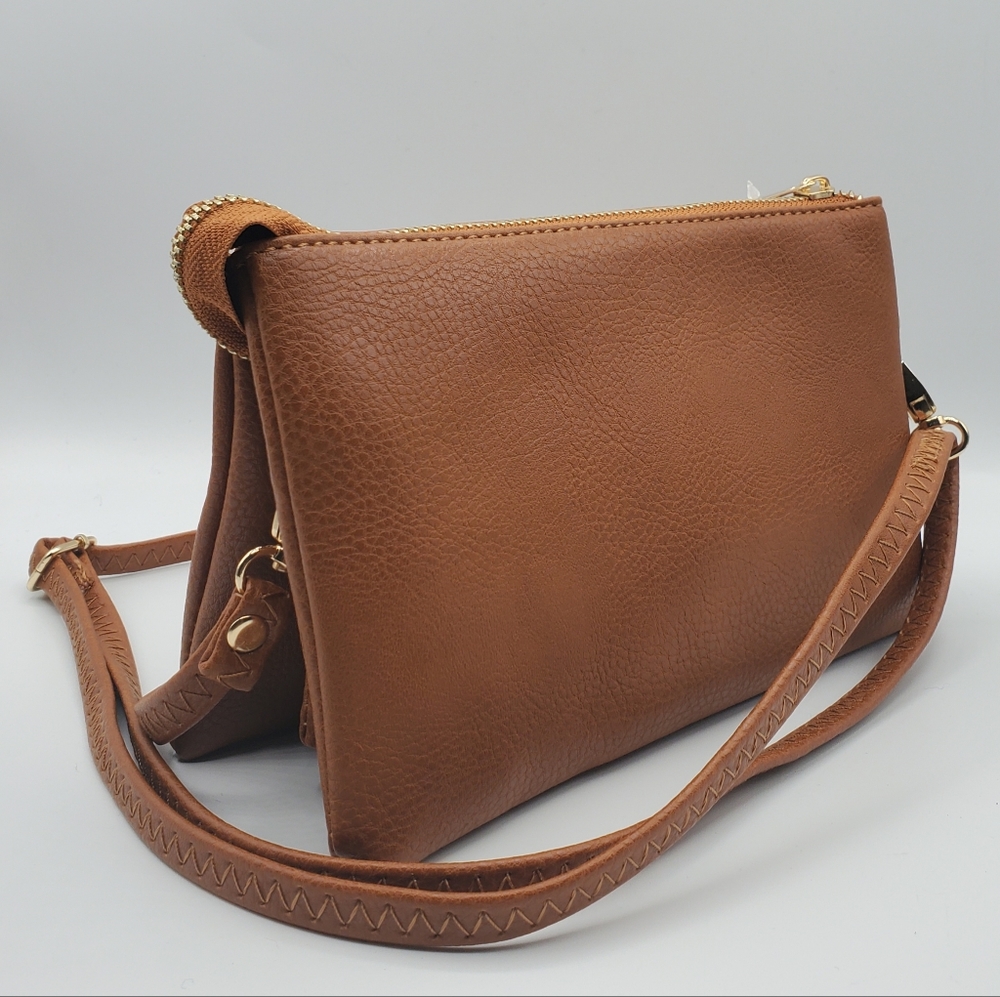 Genuine leather crossbody bag.